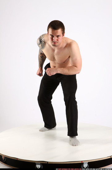 Man Adult Athletic White Fighting with knife Standing poses Pants