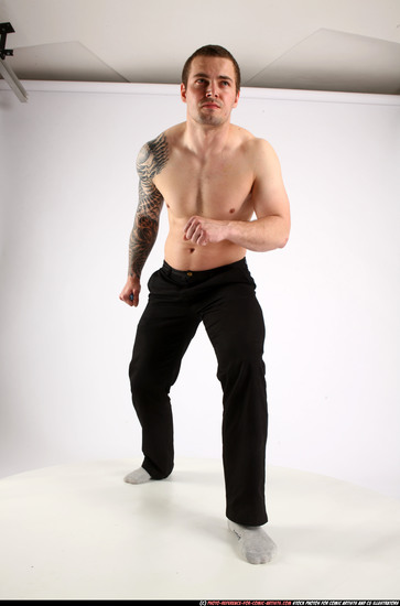 Man Adult Athletic White Fighting with knife Standing poses Pants