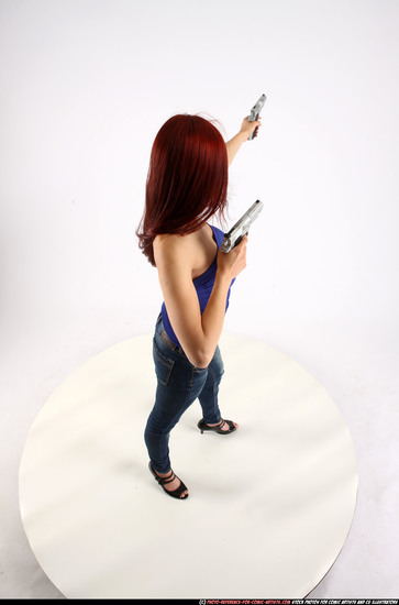 Woman Adult Athletic White Fighting with gun Standing poses Casual