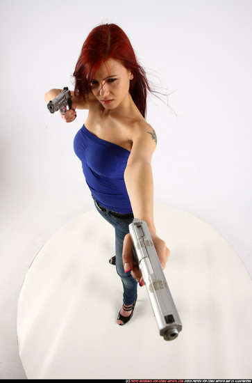 Woman Adult Athletic White Fighting with gun Standing poses Casual