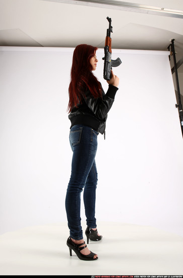 Woman Young Athletic White Fighting with submachine gun Standing poses Casual