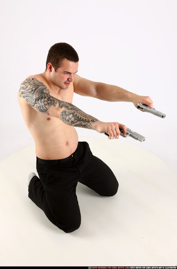 Man Adult Athletic White Fighting with gun Kneeling poses Pants