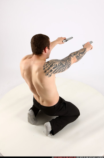 Man Adult Athletic White Fighting with gun Kneeling poses Pants