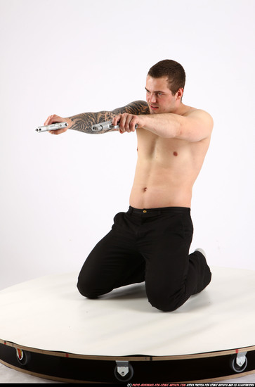 Man Adult Athletic White Fighting with gun Kneeling poses Pants