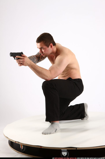 Man Adult Athletic White Fighting with gun Kneeling poses Pants