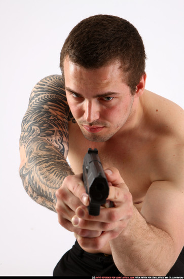 Man Adult Athletic White Fighting with gun Kneeling poses Pants