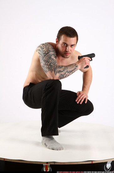 Man Adult Athletic White Fighting with gun Kneeling poses Pants