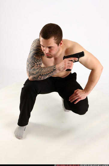 Man Adult Athletic White Fighting with gun Kneeling poses Pants