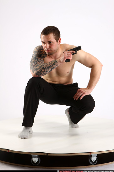 Man Adult Athletic White Fighting with gun Kneeling poses Pants