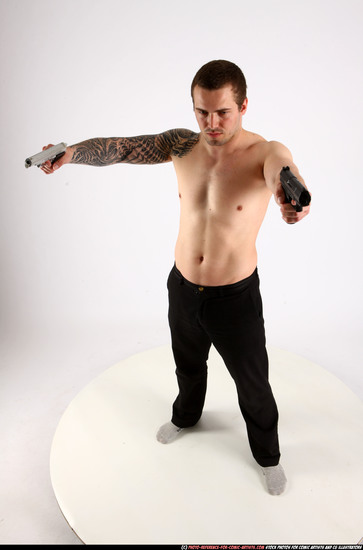 Man Adult Athletic White Fighting with gun Standing poses Pants