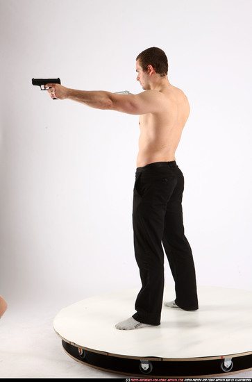 Man Adult Athletic White Fighting with gun Standing poses Pants