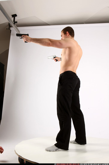 Man Adult Athletic White Fighting with gun Standing poses Pants