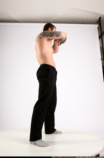 Man Adult Athletic White Fighting with knife Standing poses Pants