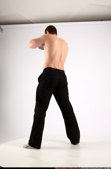 Man Adult Athletic White Fighting with knife Standing poses Pants