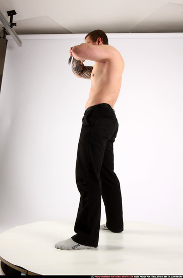 Man Adult Athletic White Fighting with knife Standing poses Pants