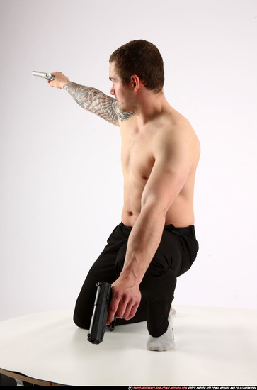 Man Adult Athletic White Fighting with gun Kneeling poses Pants