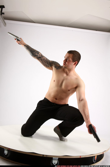 Man Adult Athletic White Fighting with gun Kneeling poses Pants