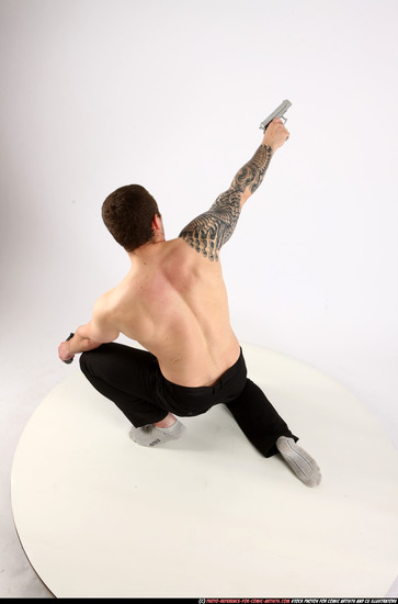 Man Adult Athletic White Fighting with gun Kneeling poses Pants