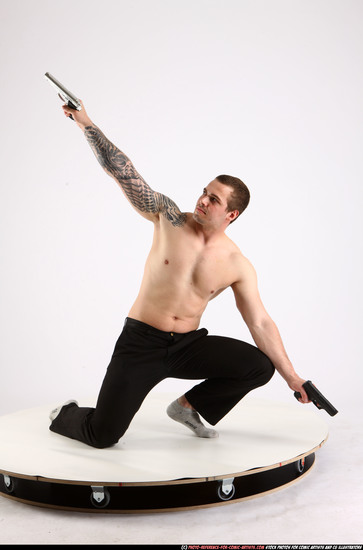 Man Adult Athletic White Fighting with gun Kneeling poses Pants