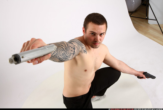 Man Adult Athletic White Fighting with gun Kneeling poses Pants