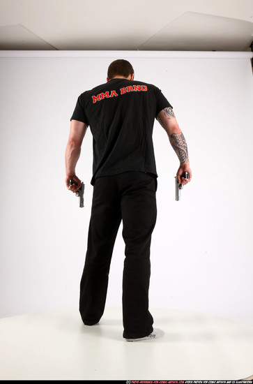 Man Adult Athletic White Fighting with gun Standing poses Casual