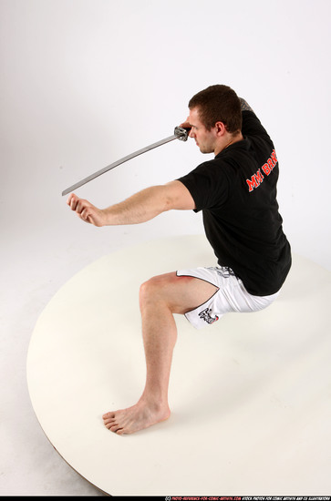 Man Adult Athletic White Fighting with sword Kneeling poses Sportswear