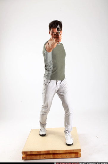 Man Adult Muscular White Fighting with gun Standing poses Casual