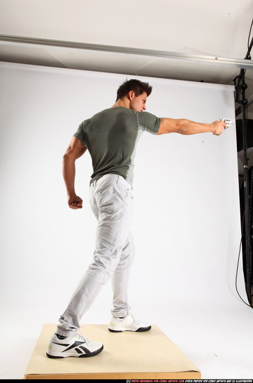 Man Adult Muscular White Fighting with gun Standing poses Casual