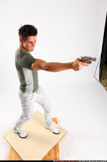 Man Adult Muscular White Fighting with gun Standing poses Casual