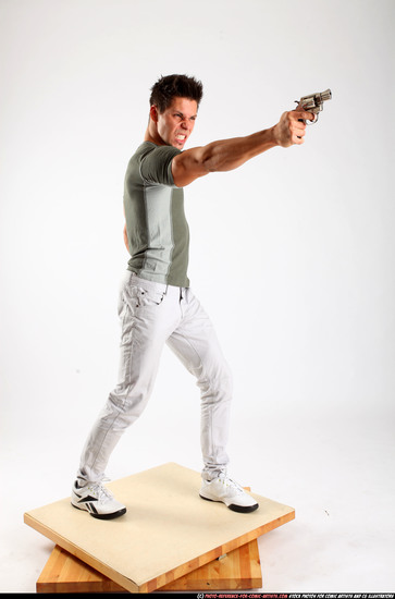 Man Adult Muscular White Fighting with gun Standing poses Casual