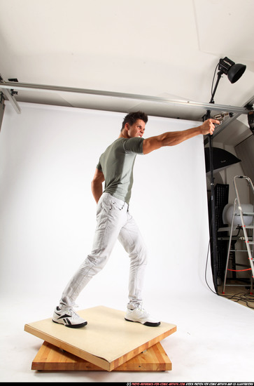 Man Adult Muscular White Fighting with gun Standing poses Casual