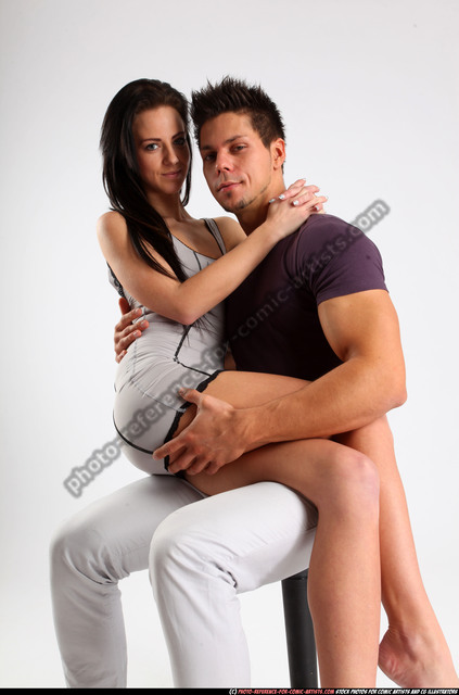 Man and a Pregnant Woman Sitting on his Lap · Free Stock Photo