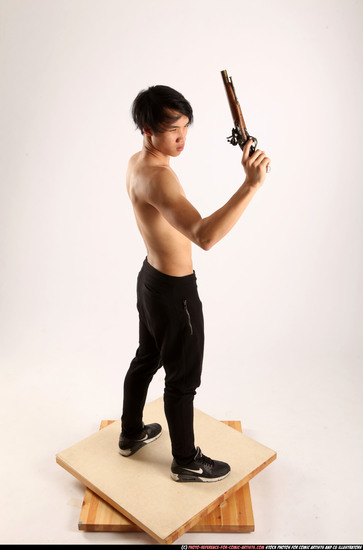 Man Young Athletic Fighting with rifle Standing poses Pants Asian