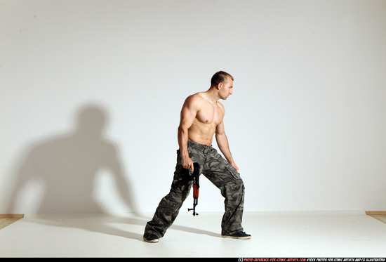 Man Adult Muscular White Fighting with submachine gun Moving poses Pants