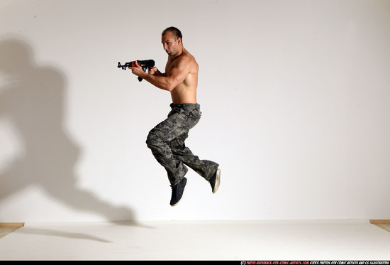 Man Adult Muscular White Fighting with submachine gun Moving poses Pants