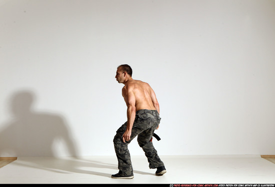 Man Adult Muscular White Fighting with submachine gun Moving poses Pants