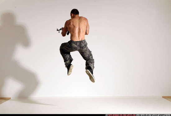 Man Adult Muscular White Fighting with submachine gun Moving poses Pants