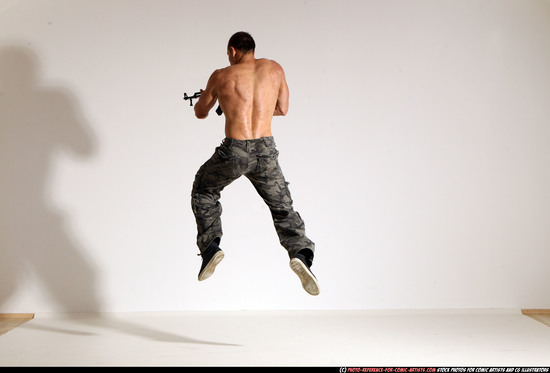 Man Adult Muscular White Fighting with submachine gun Moving poses Pants