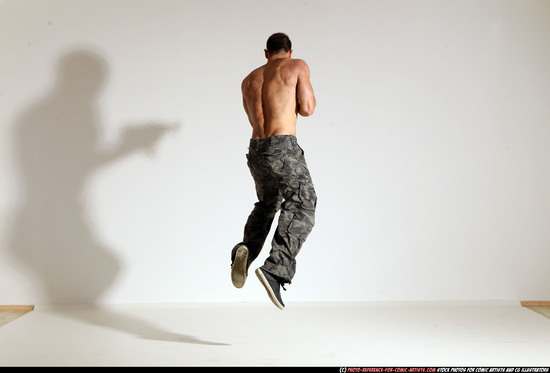 Man Adult Muscular White Fighting with submachine gun Moving poses Pants