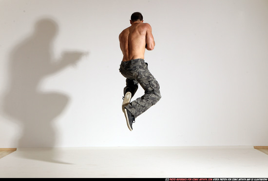 Man Adult Muscular White Fighting with submachine gun Moving poses Pants