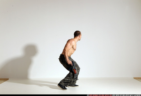 Man Adult Muscular White Fighting with submachine gun Moving poses Pants