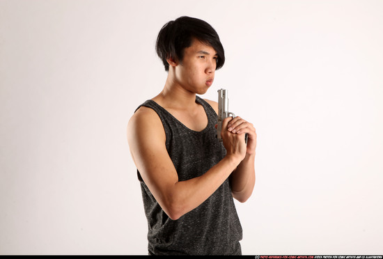 Man Young Athletic Fighting with gun Detailed photos Casual Asian