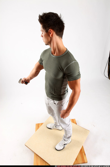 Man Adult Athletic White Fighting with gun Standing poses Casual