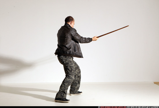 Man Adult Athletic White Fighting with sword Moving poses Casual