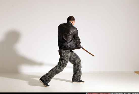 Man Adult Athletic White Fighting with sword Moving poses Casual