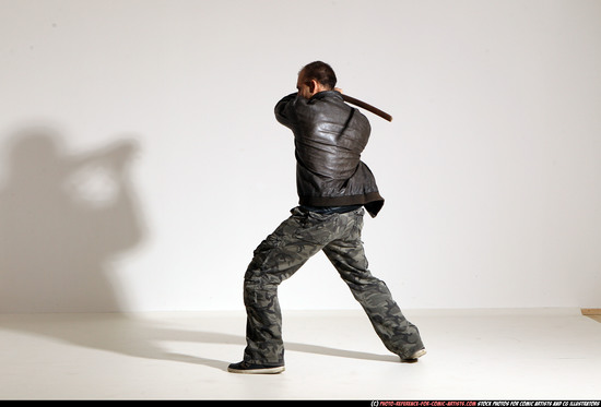 Man Adult Athletic White Fighting with sword Moving poses Casual