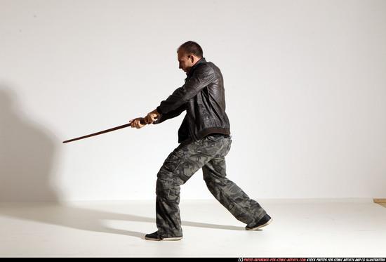 Man Adult Athletic White Fighting with sword Moving poses Casual