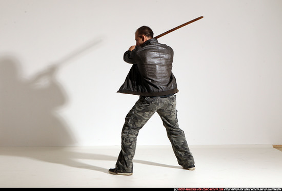 Man Adult Athletic White Fighting with sword Moving poses Casual