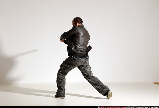 Man Adult Athletic White Fighting with sword Moving poses Casual