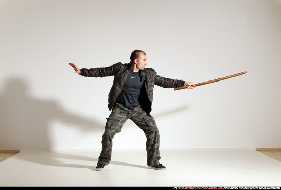 Man Adult Athletic White Fighting with sword Moving poses Casual